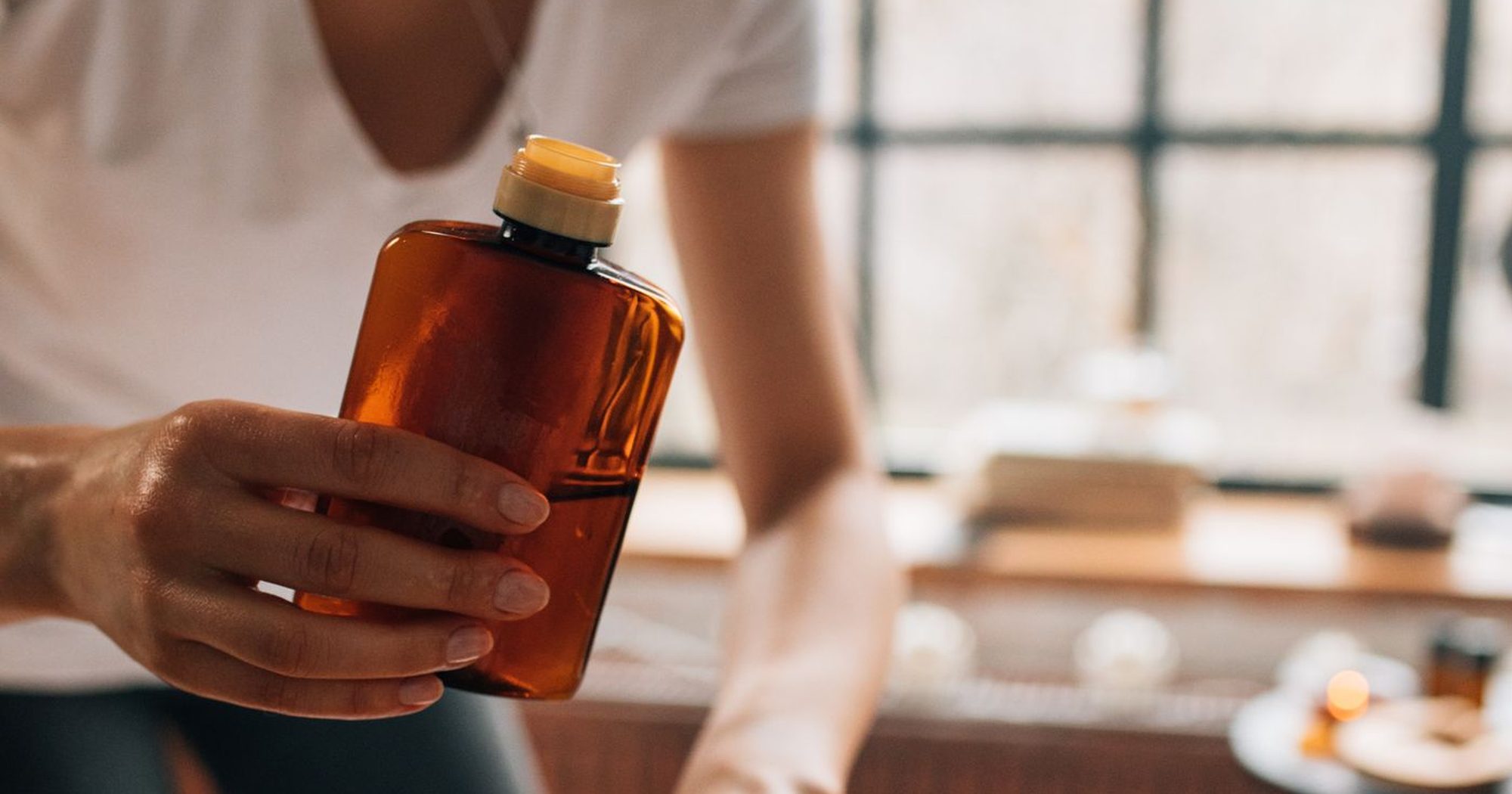 Warm oils poured during a home massage